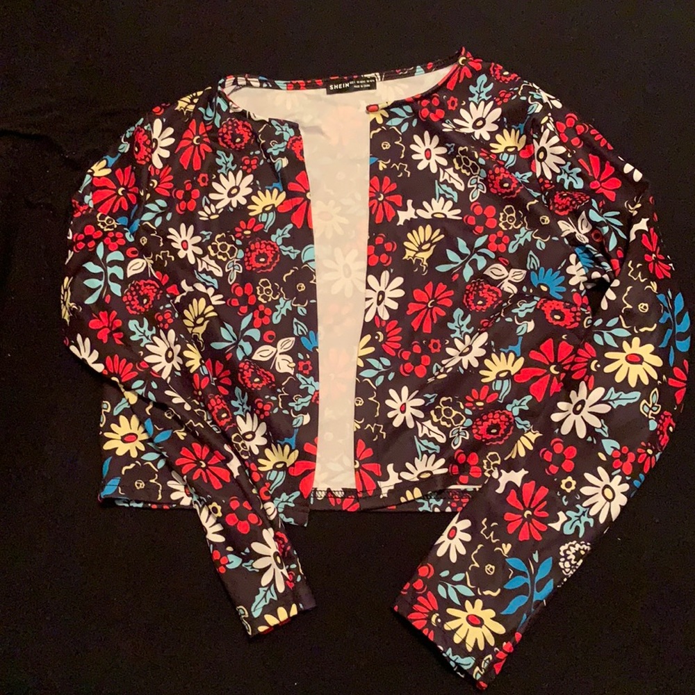 Light jacket. Sized medium. Never worn.